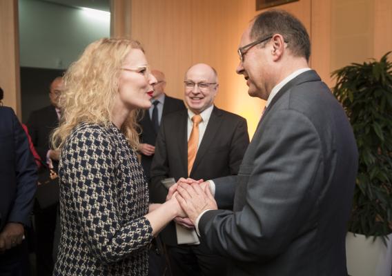 Kelly Stange, an Agricultural Counselor for Germany, Austria, Hungary & Slovenia with USDA’s Foreign Agriculture Service greets Christian Schmidt, German Federal Minister of Food and Agriculture