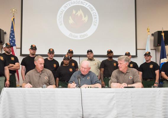 U.S. Department of Agriculture Secretary Sonny Perdue, Interior Secretary Ryan Zinke sign a memorandum to wildland fire leadership in Boise, Idaho, on June 2, 2017. USDA Photo by Lance Cheung.