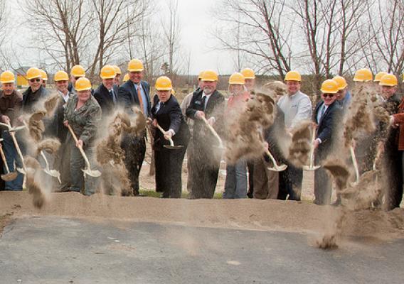 Sen. Al Franken (eighth from left) joined officials from NESC and Rural Development in April to break ground on a project that will create jobs and deliver broadband to rural areas of Northeastern Minnesota.