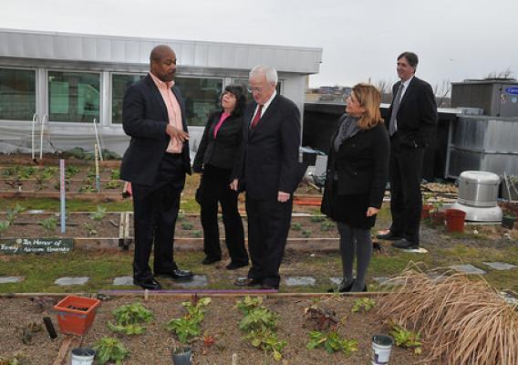 Bread for the City CEO George Jones (far left) shows the organization’s rooftop garden to AMS Administrator Anne Alonzo (right with black coat and grey shirt), AMS Associate Administrator Rex Barnes (far right), Food Nutrition and Consumer Services Under Secretary Kevin Concannon (middle), and FNS Associate Administrator for the Supplemental Nutrition Assistance Program Jessica Shahin (middle left).